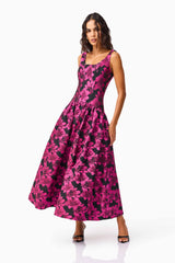 Brunette model wearing the Holly A-Line Gown in Pink & Black Floral posed shot