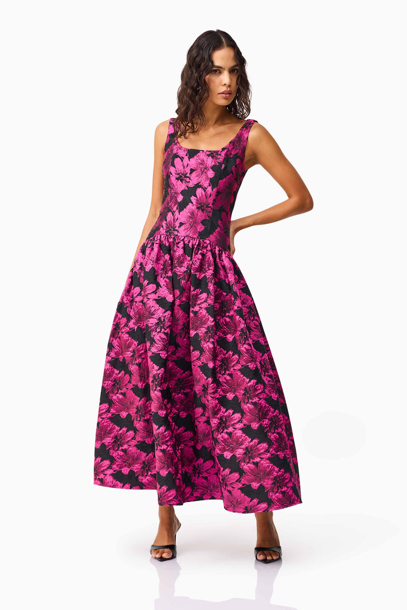 Brunette model wearing the Holly A-Line Gown in Pink & Black Floral posed shot 2