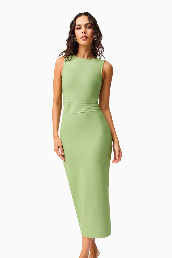 Brunette model wearing the Seraphina Fitted Midi Dress in Green close up shot
