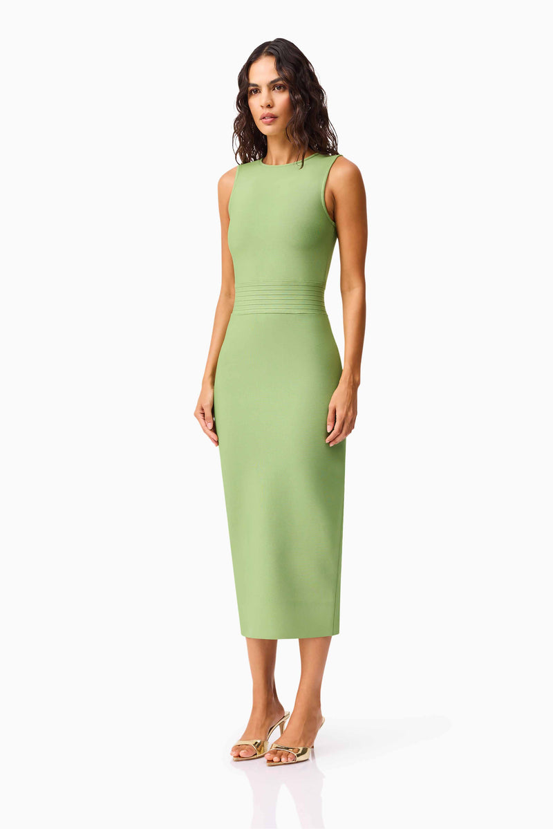 Brunette model wearing the Seraphina Fitted Midi Dress in Green side shot