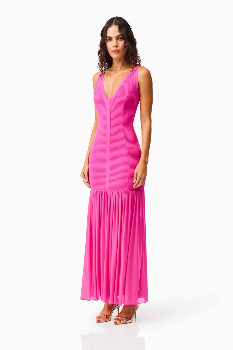 Brunette model wearing the Seraphina Gown in Pink side shot