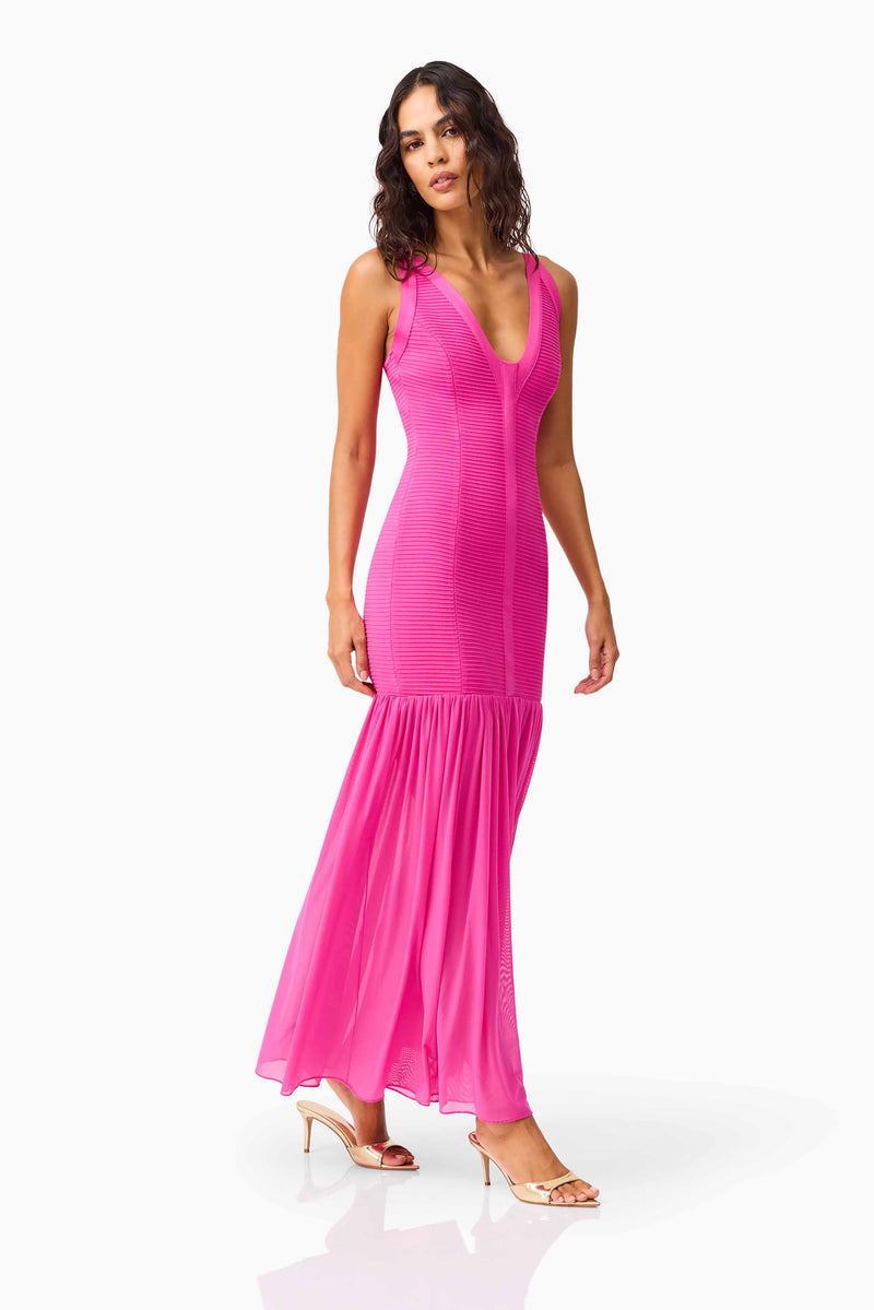 Brunette model wearing the Seraphina Gown in Pink posed shot