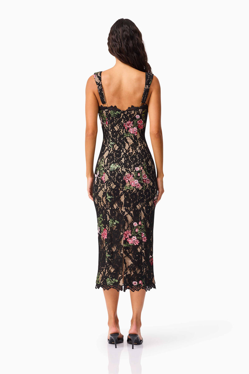 Brunette model wearing the Morgaine Lace Midi Dress in Black back shot