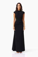 Brunette model wearing the Danica High Neck Gown in Black front shot