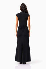 Brunette model wearing the Danica High Neck Gown in Black back shot