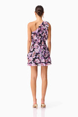 Brunette model wearing the Solene One Shoulder Mini Dress in Purple Floral Back Shot