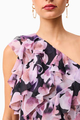 Brunette model wearing the Solene One Shoulder Mini Dress in Purple Floral Detail Shot