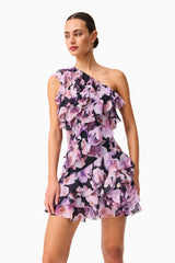 Brunette model wearing the Solene One Shoulder Mini Dress in Purple Floral Close Up Shot