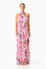 Brunette model wearing the Solene Halter Gown in Pink Floral front shot
