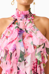 Brunette model wearing the Solene Halter Gown in Pink Floral detail shot