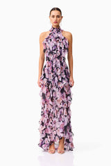 Brunette model wearing Solene Halter Gown in Purple Floral front shot
