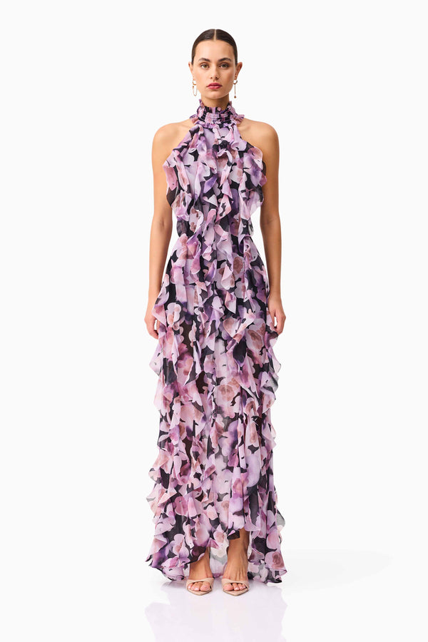 Brunette model wearing Solene Halter Gown in Purple Floral front shot
