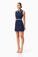 Brunette model wearing Melody Jacquard Mini Dress in Blue side shot