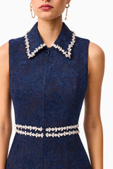 Brunette model wearing Melody Jacquard Mini Dress in Blue detailed shot