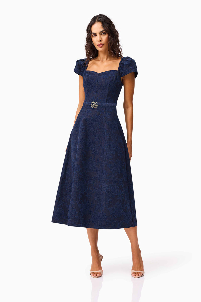 Brunette model wearing Melody Jacquard Short Sleeve Midi Dress in Blue posed shot