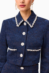 Brunette model wearing Melody Jacquard Top & Skirt Set in Blue top detailed shot