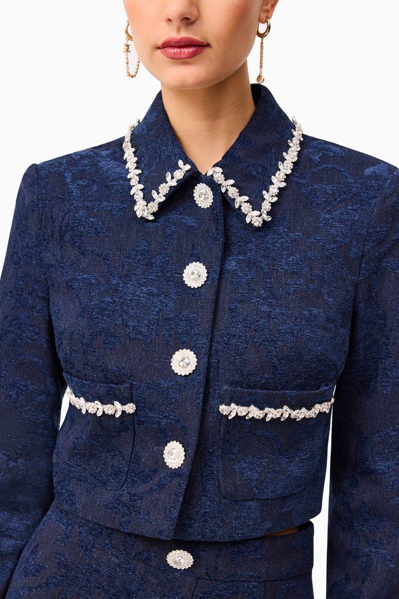 Brunette model wearing Melody Jacquard Top & Skirt Set in Blue top detailed shot