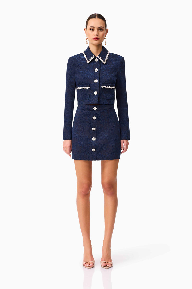 Brunette model wearing Melody Jacquard Top & Skirt Set in Blue front shot