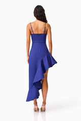 Brunette model wearing Beatrix Asymmetrical Gown in Blue back shot