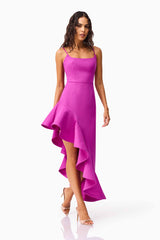 Brunette model wearing Beatrix Asymmetrical Gown in Purple posed shot