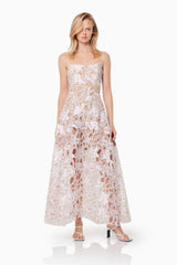 Blonde model wearing the Connection Maxi Gown In Purple posed shot