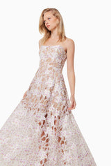 Blonde model wearing the Connection Maxi Gown In Purple close up shot