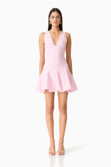 Brunette model wearing the Marla V-Neck Mini Dress in Pink front shot