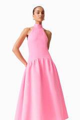 Brunette model wearing The Nolana Halter Midi dress in Pink front posed shot