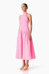Brunette model wearing The Nolana Halter Midi dress in Pink side shot