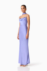 Brunette model wearing the Jacinta Cowl Neck Gown in Blue side shot