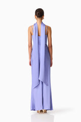 Brunette model wearing the Jacinta Cowl Neck Gown in Blue back shot
