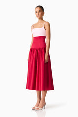 Brunette model wearing the June A-Line Gown in Pink & Red side shot