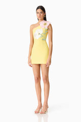 Brunette model wearing Hope One Shoulder Mini Dress in Yellow side shot