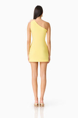 Brunette model wearing Hope One Shoulder Mini Dress in Yellow back shot