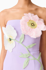 Brunette model wearing the Hope Strapless Midi Dress in Purple detail shot 