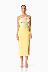 Brunette model wearing the Hope Strapless Midi Dress in Yellow front shot 