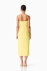 Brunette model wearing the Hope Strapless Midi Dress in Yellow back shot 