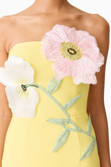 Brunette model wearing the Hope Strapless Midi Dress in Yellow detail shot