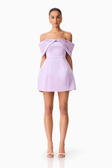 Brunette model wearing the Hope Off the Shoulder Mini Dress in Purple front shot 