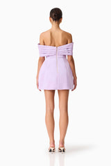 Brunette model wearing the Hope Off the Shoulder Mini Dress in Purple back shot 