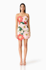 Brunette model wearing the Solara Strapless Mini Dress in Pink Floral front shot 