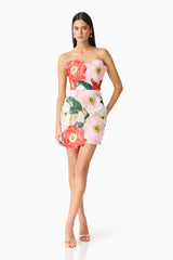 Brunette model wearing the Solara Strapless Mini Dress in Pink Floral posed shot 