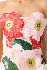 Brunette model wearing the Solara Strapless Mini Dress in Pink Floral detail shot 