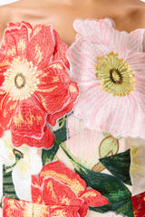 Brunette model wearing the Solara Strapless Midi Dress in Pink Floral detail shot 