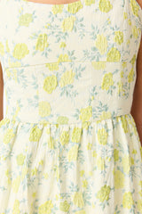 Brunette model wearing Posey Jacquard Gown in Green Floral detail shot