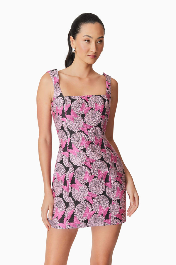 Brunette model wearing Aimee Floral Mini Dress in Pink close up shot