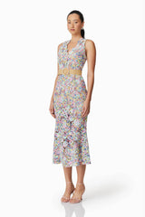Brunette model wearing Rue Crochet Midi Dress in Purple side shot