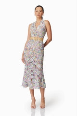 Brunette model wearing Rue Crochet Midi Dress in Purple posed shot