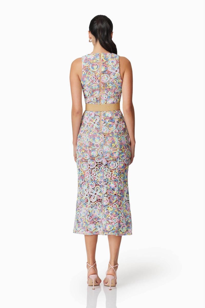 Brunette model wearing Rue Crochet Midi Dress in Purple back shot