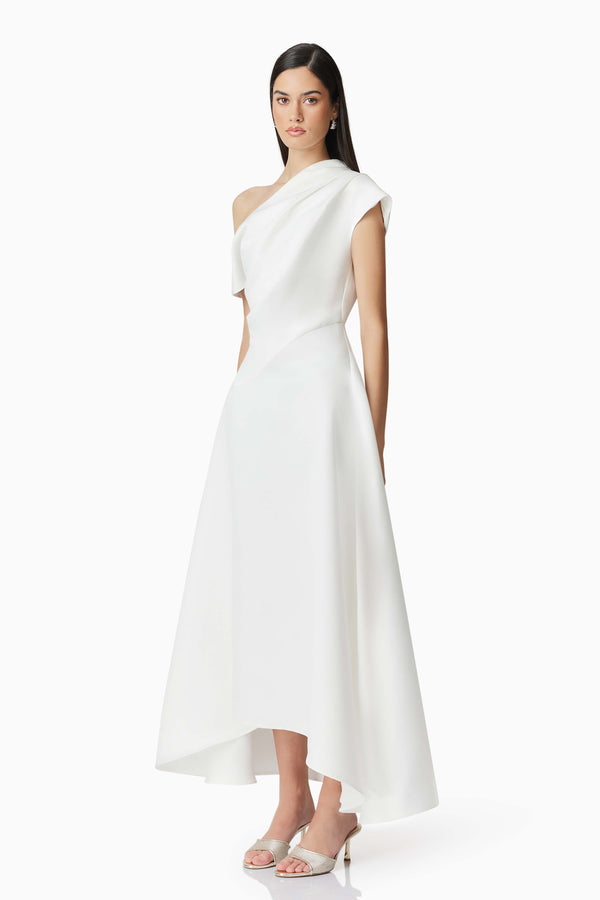 Brunette model wearing Marissa One Shoulder Gown in White posed shot